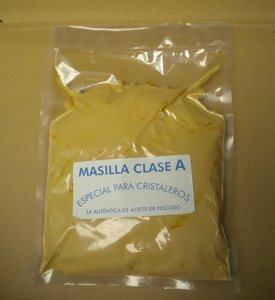 Massa de vidraceiro (masilla para acristalar), material acinzentado usado para vedar vidros em caixilhos de madeira